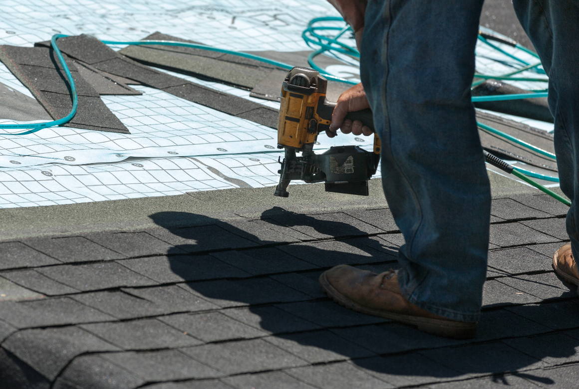 Roofing Contractor Making Repairs Roofing Contractor Making Repairs